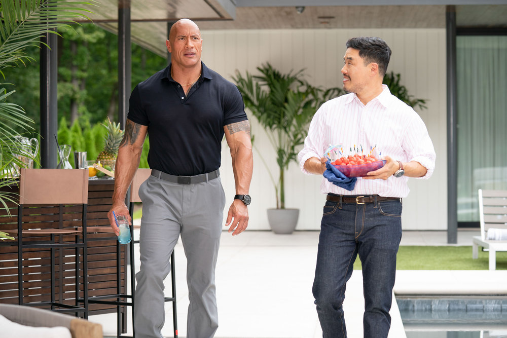 https://alexusrenee.com/wp-content/uploads/sites/8/2022/11/Dwayne-Johnson-discusses-his-life-with-Randall-Park-on-Young-Rock-Season-3-Episode-3.jpg